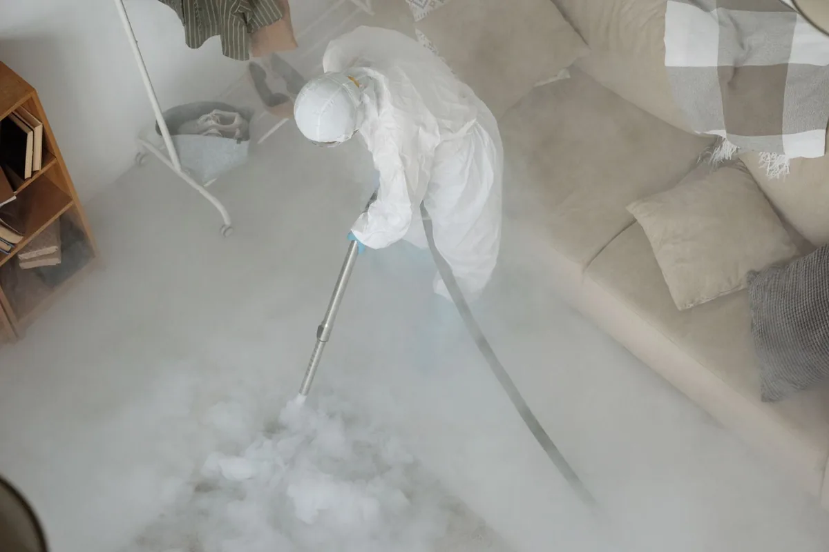 Biohazard cleanup technician in protective equipment, Slidell, LA
